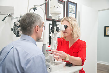 A customer gets an eye exam at Compass Vision Center, Mt Pleasant.