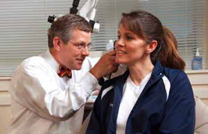 Dr. Eugene G. Brown treats a patient at the Mount Pleasant office of Charleston ENT.