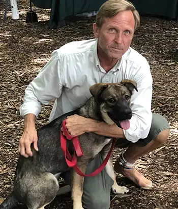 Robert Hopkins with his dog.